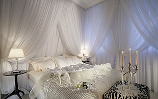 white bed setting shown